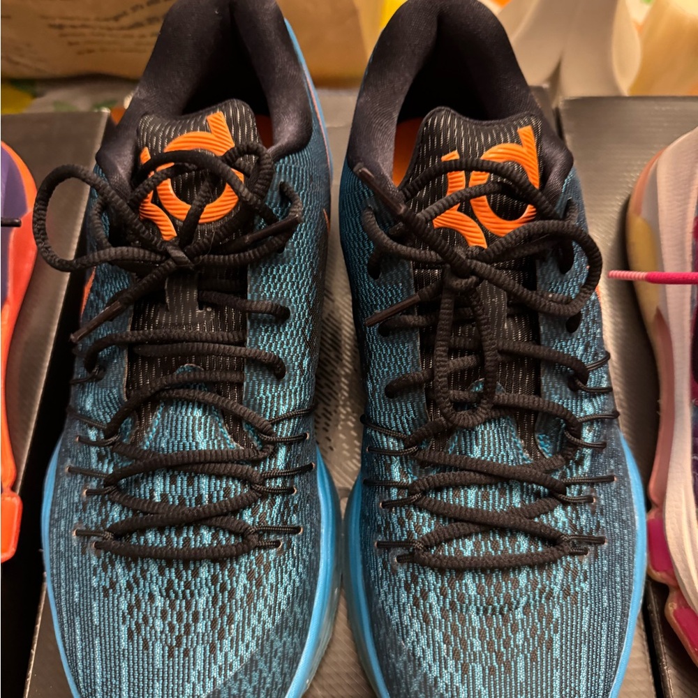 Nike Blue and Orange Athletic Shoes with Mesh Upper